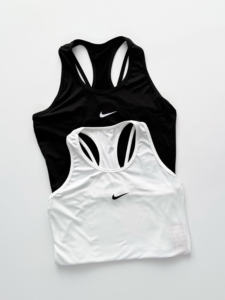 تاپ ورزشی زنانه فلامنت پشت بندی مینیمال نایکی Nike